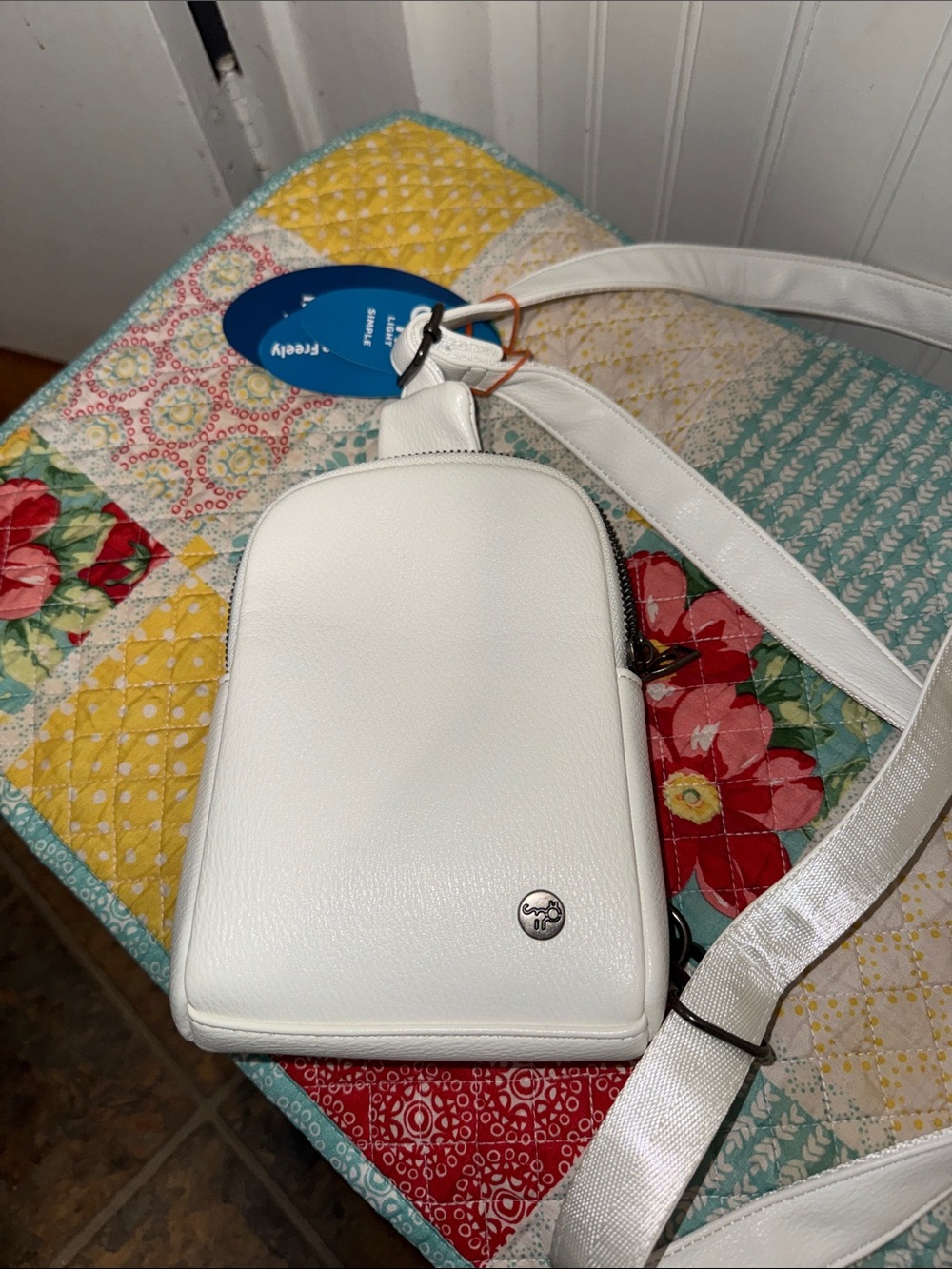 White Pebbled Crossbody Phone Bag with Signature Disc Accent